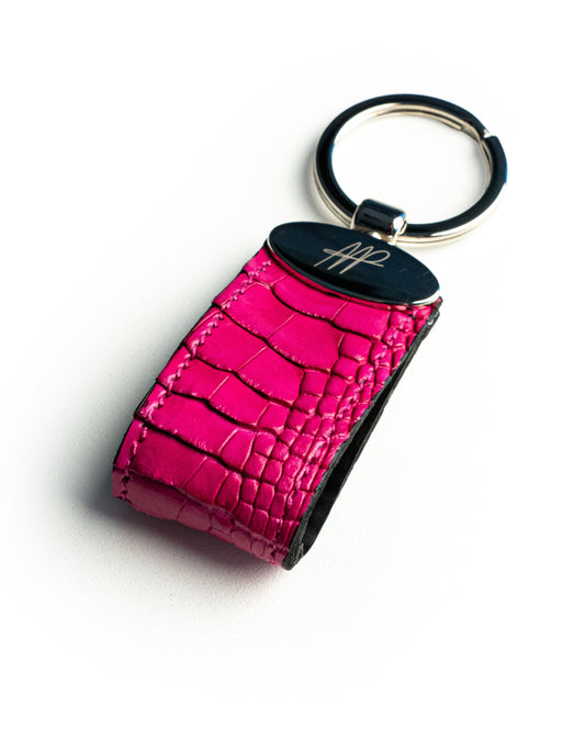 Portachiavi in pelle di alligatore fucsia, stile classico